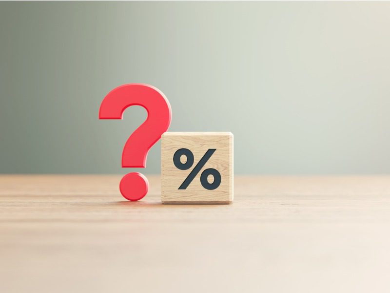 Red question mark beside a wooden block with a percent symbol