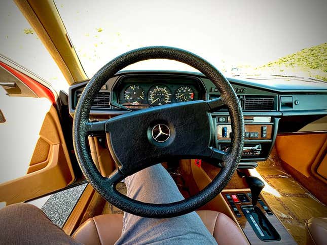 Image for article titled At $10,900, Could This Leather-Upholstered 1985 Mercedes 190E Get You to Have a Cow?