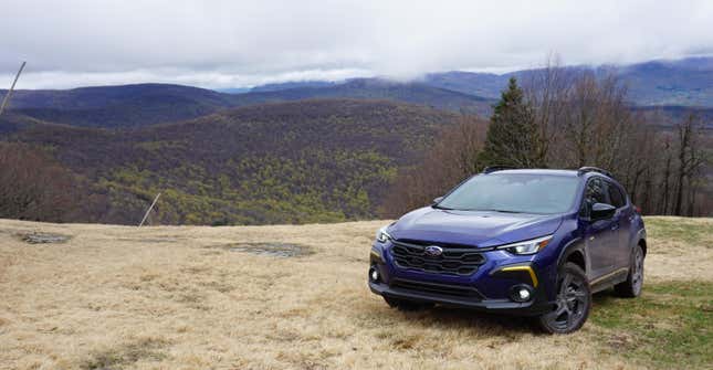 A blue 2024 Subaru Crosstrek Sport.