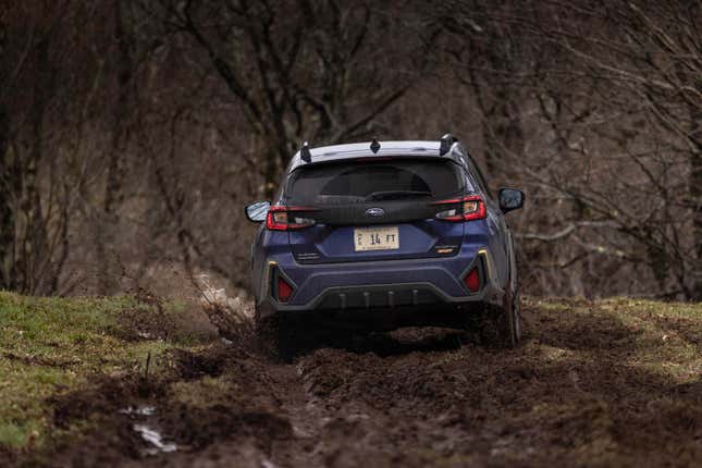 A blue 2024 Subaru Crosstrek Sport.