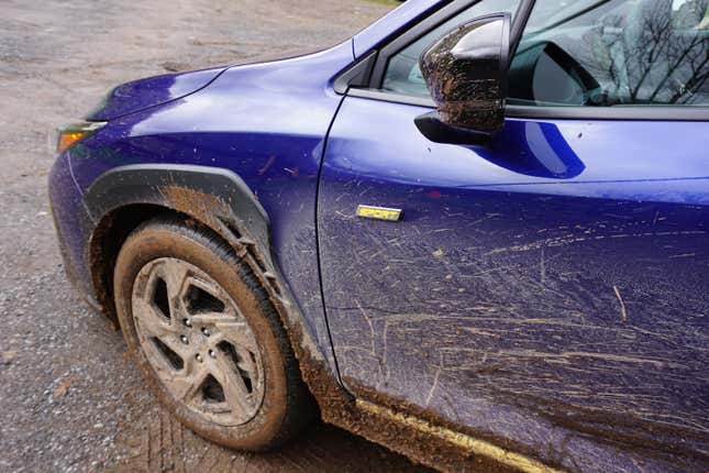 A blue 2024 Subaru Crosstrek Sport.