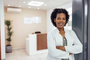 young smiling dermatologist woman