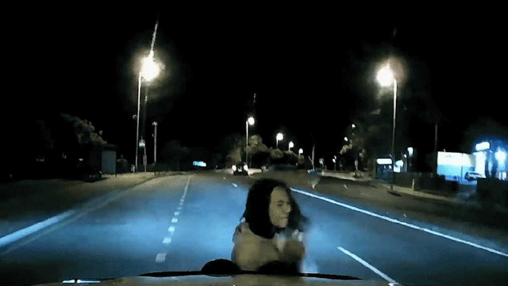 Dashcam Captures Woman Running into Car in Possible Carjacking Attempt