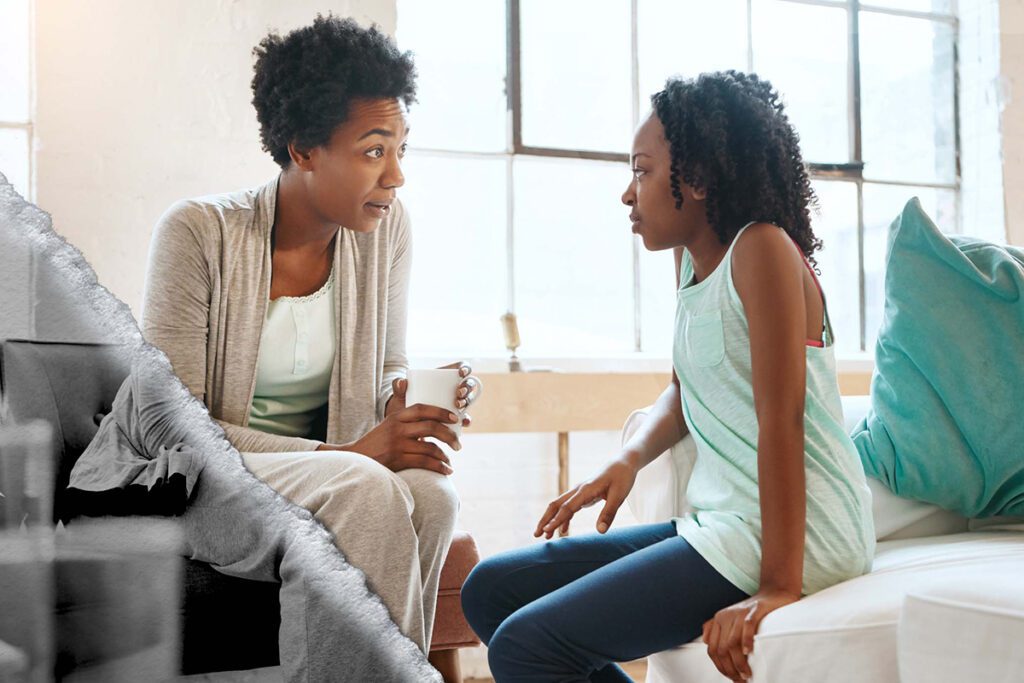 A mother talks to her teen daughter about mental health issues.