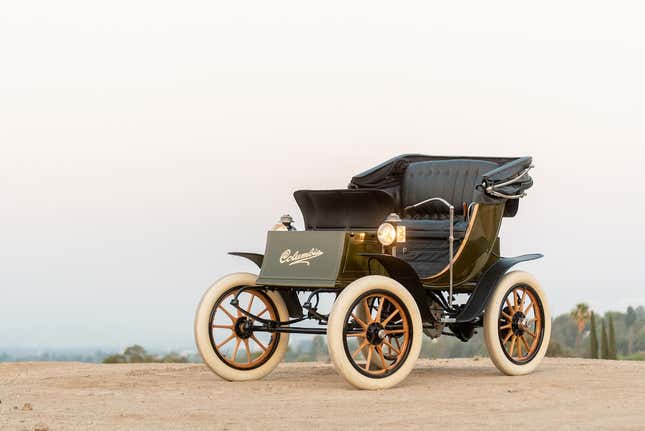 Columbia Victoria Electric Phaeton on a desert, sandy landscape