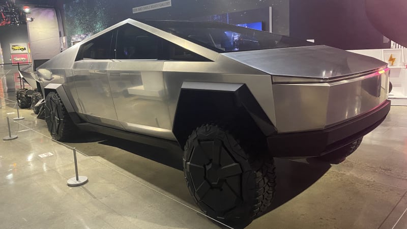 Tesla Cybertruck features, including 'vault' and no door handles, demonstrated