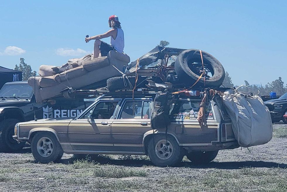 offroad wagon with couch on the hood