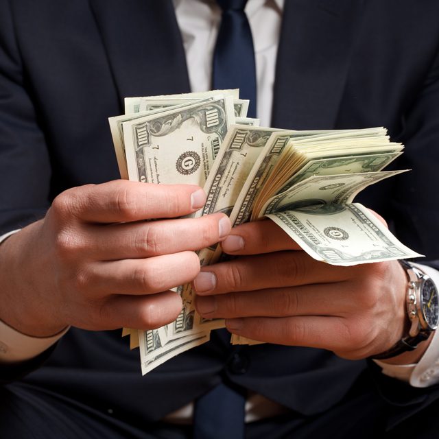 A Businessman counting money