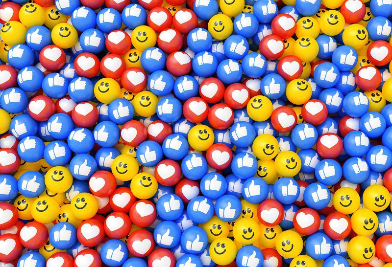 Social media icon background. Multicolor balls with smile face, heart and thumbs up symbols.