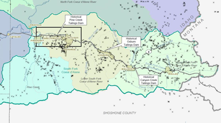 A map is pocked with x's showing mine sites across the region, mostly east of the Bunker Hill fire site.