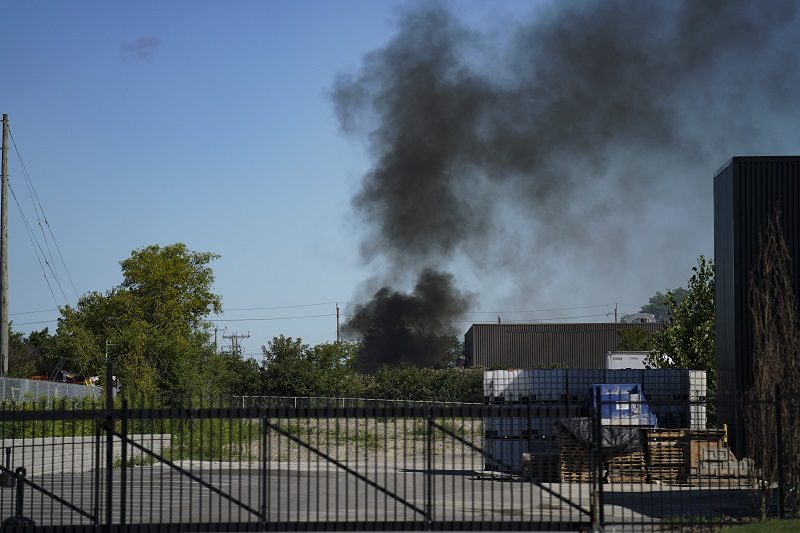 Smoke rises from a massive fire at an industrial site in Toronto