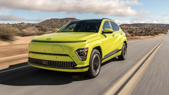 A lime green 2024 Hyundai Kona Electric on a desert road