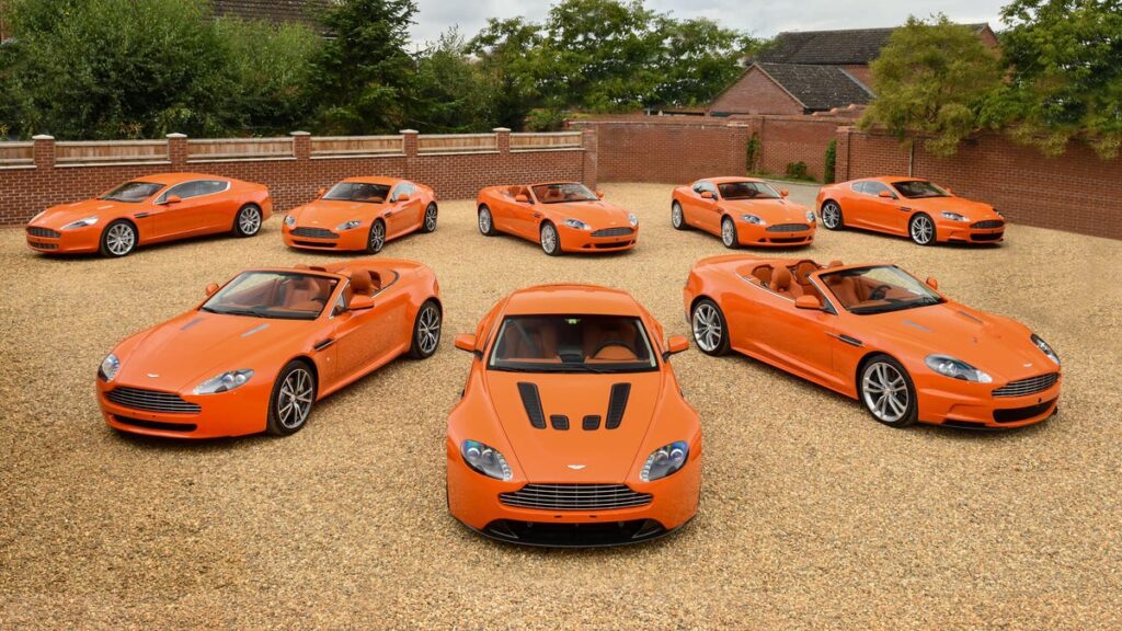 For Almost $500K, These Orange Aston Martins Can Be Your Whole Personality