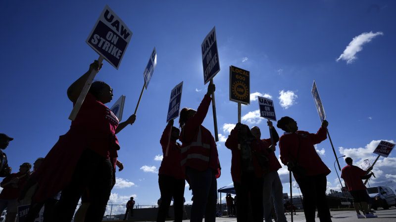 5 workers on UAW picket line struck by car at GM plant