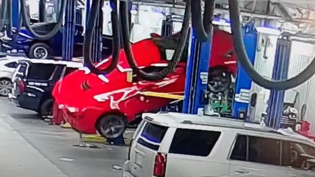 Watch a Chevrolet Corvette Z06 fall off the lift at a dealer