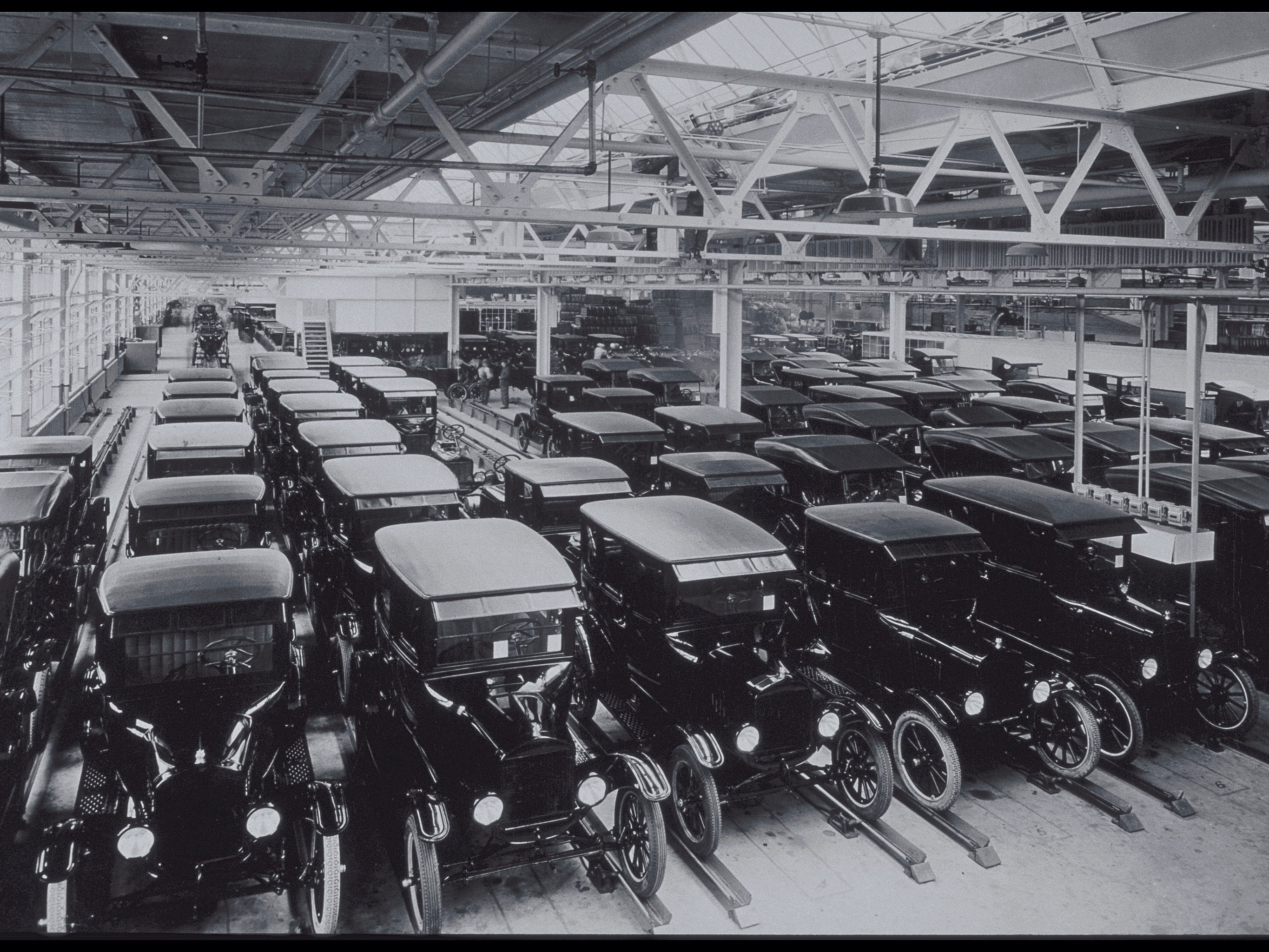 NEW FORD MOTORCARS GROUPED IN WAREHOUSE, 1925.