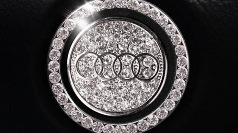 Don't put that rhinestone emblem on your car's steering wheel, safety officials say