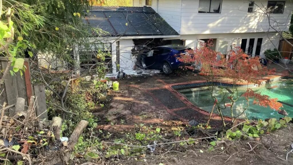 Tesla Model X flies over a swimming pool and crashes into a house