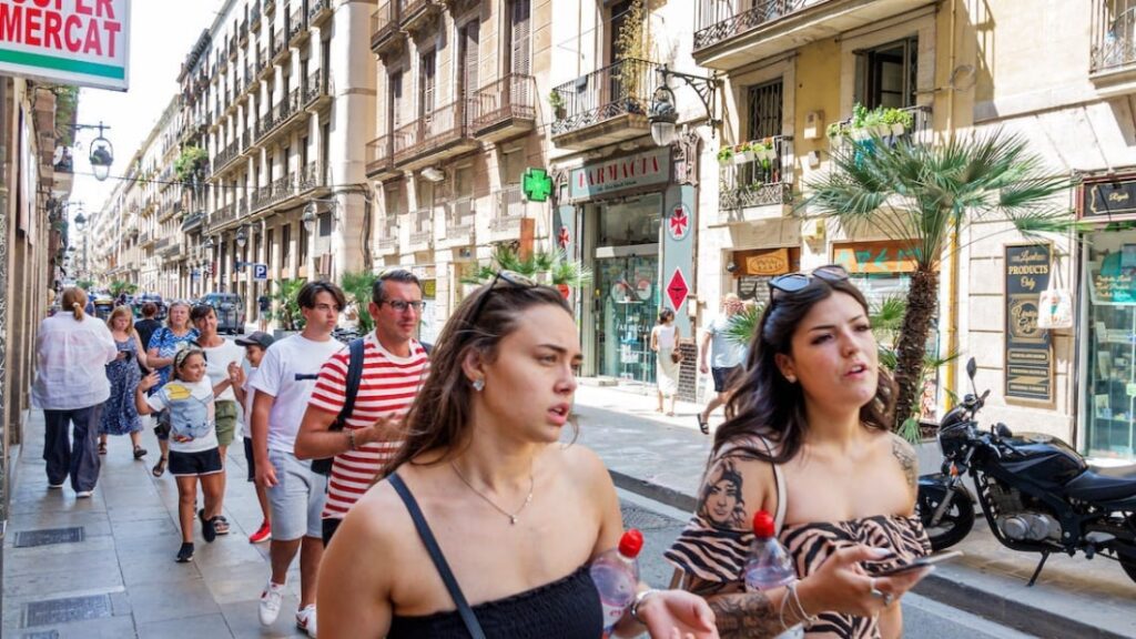 Key to solving loneliness, pollution might be giving up cars, hanging out in the street. It's working in Barcelona