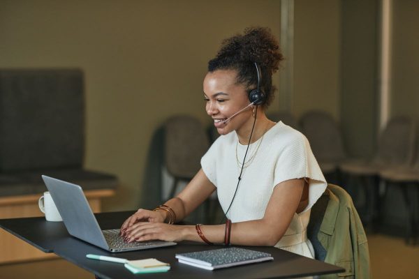 Woman in a call centre speaking on the phone