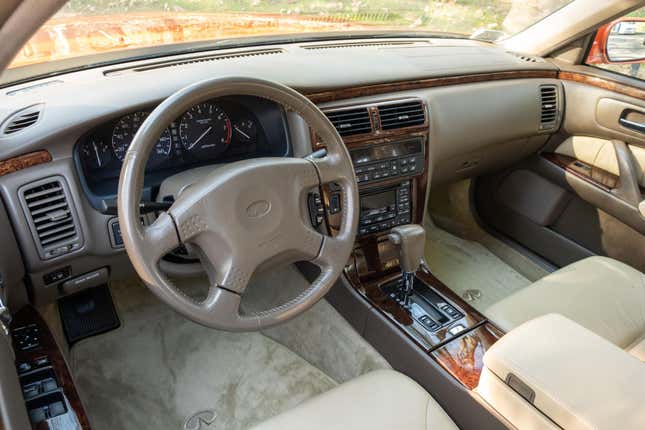 Image for article titled This Nacho Cheese Orange Infiniti Q45 Is The Only Infiniti Worth Buying