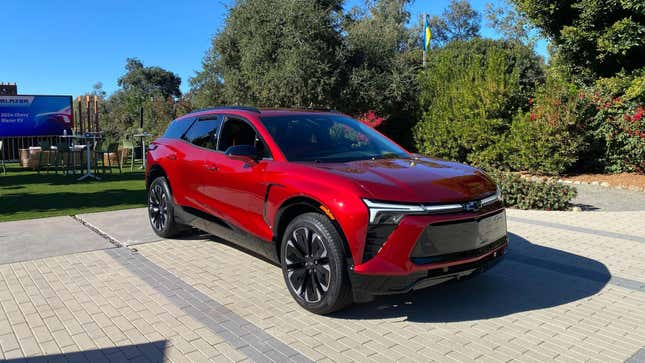 The front 3/4 of a Blazer EV RS eAWD in Radical Red Tintcoat