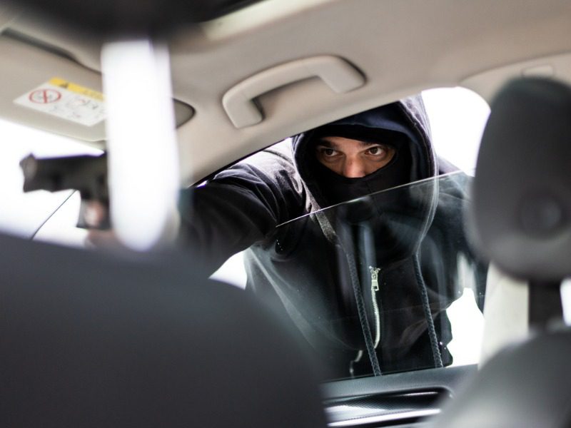 Carjacker with gun