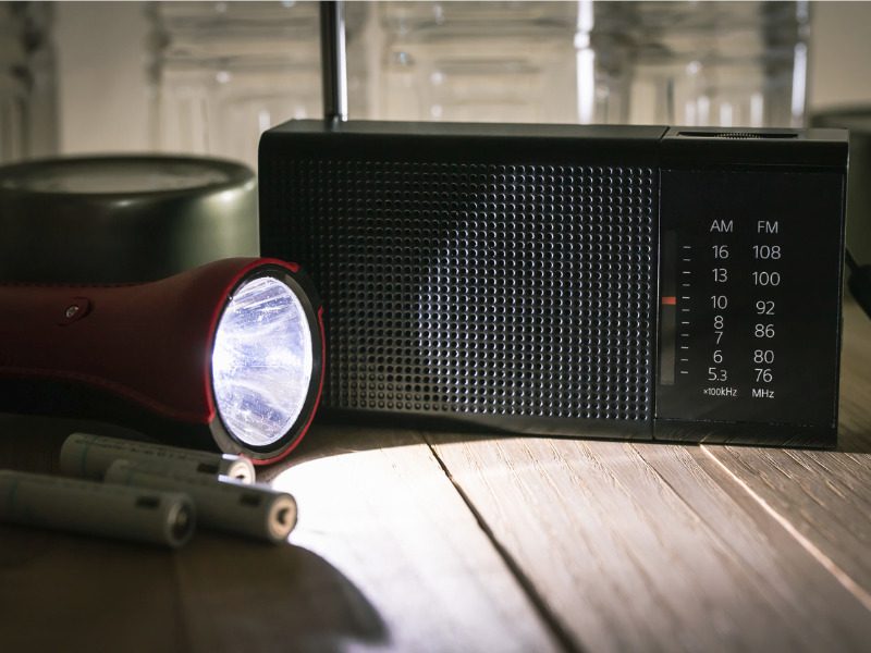 Radio and flashlight, symbolizing disaster prevention