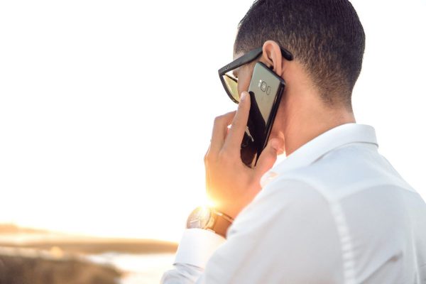 Person talking on the phone outside