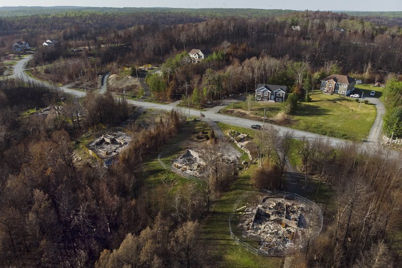 Damage to homes from a wildfire outside of Halifax.