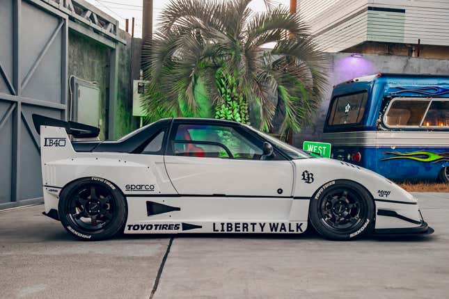 Side view of a white Autozam AZ-1 with a Ferrari F40 bodykit