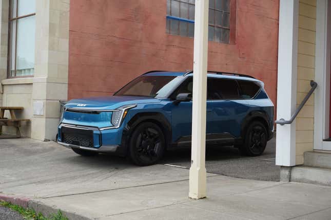 A blue 2024 Kia EV9 GT-Line.