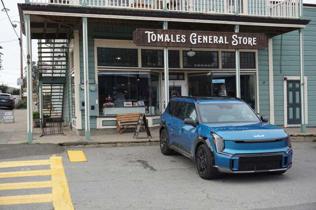 A blue 2024 Kia EV9 GT-Line.