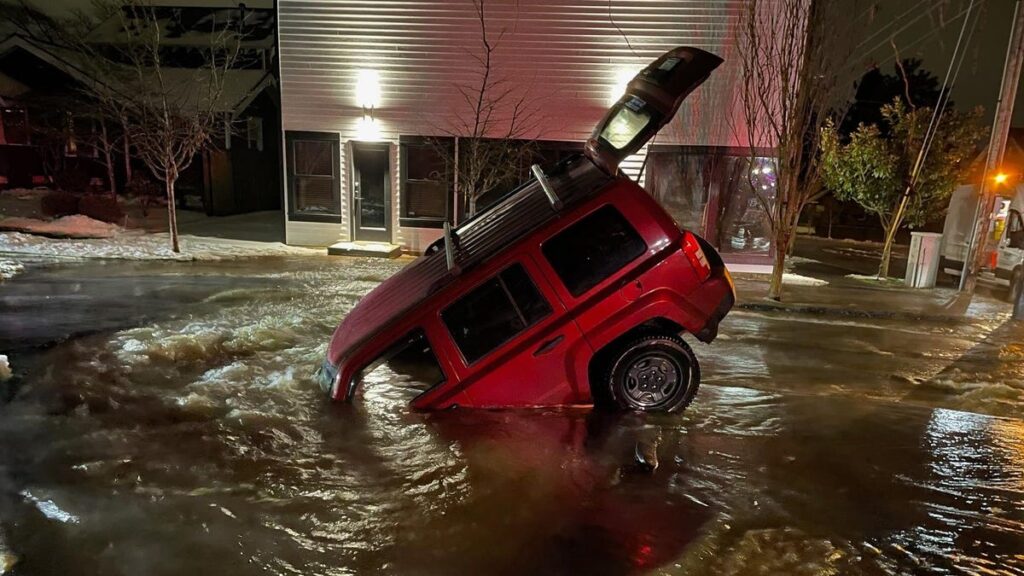 Manual Windows Saves Couple After Sinkhole Swallows Jeep