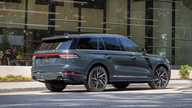 Rear 3/4 view of a green Lincoln Aviator