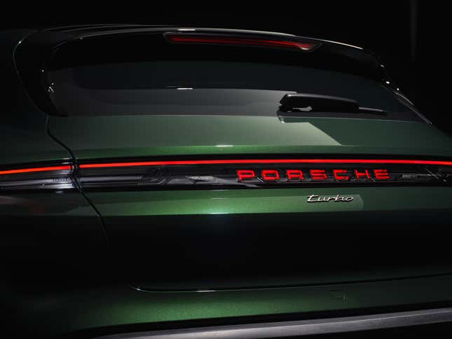 Taillights of a green 2025 Porsche Taycan Cross Turismo