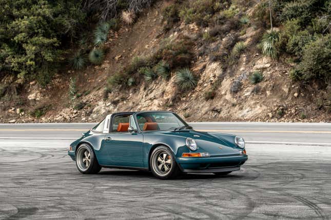 A front 3/4 view of the 300th singer on a mountain road