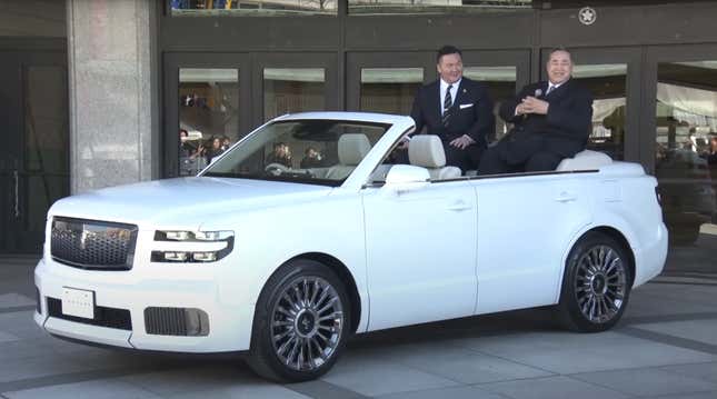 Front 3/4 view of a white Toyota Century SUV convertible