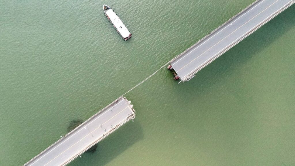 Container Ship Hits Bridge, Knocking Cars Into River Below