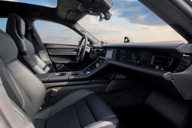 Dashboard and front seats of a purple Porsche Taycan Turbo GT