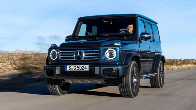 Front 3/4 view of a Twilight Blue Metallic 2025 Mercedes-Benz G550