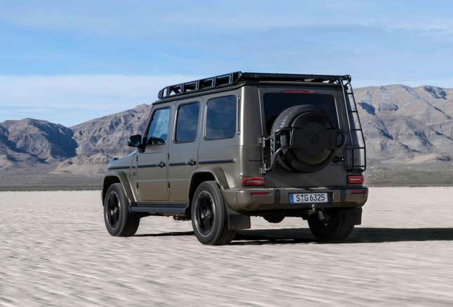 Rear 3/4 view of a Dark Olive Green Magno 2025 Mercedes-AMG G63