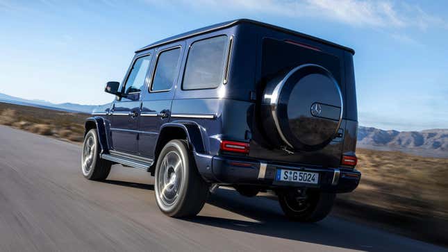 Rear 3/4 view of a Twilight Blue Metallic 2025 Mercedes-Benz G550