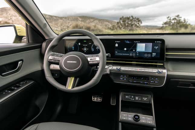 The interior of the highlighter yellow Kona Electric 