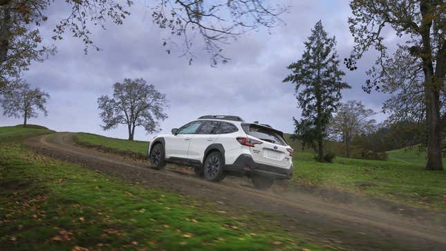 A photo of a white Subaru Outback Wilderness. 