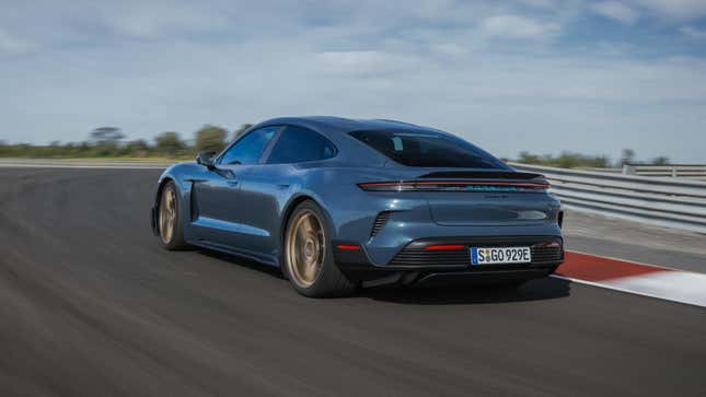 Rear 3/4 view of a blue Porsche Taycan Turbo GT