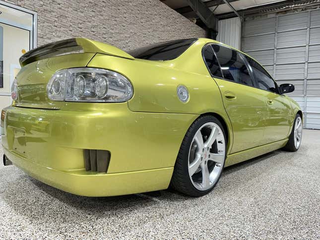 A rear 3/4 shot of the Malibu Cruiser parked in a garage