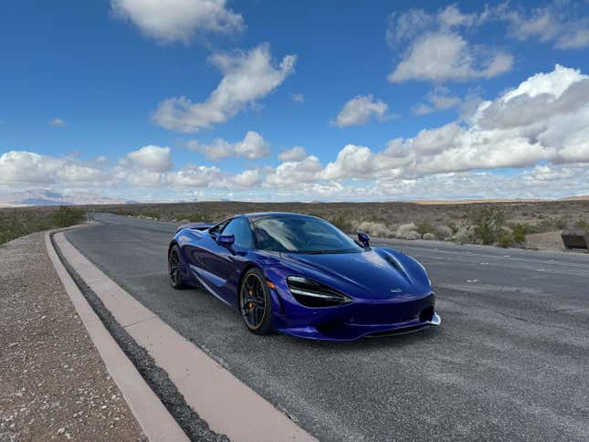 Front 3/4 view of a purple McLaren 750S Spider