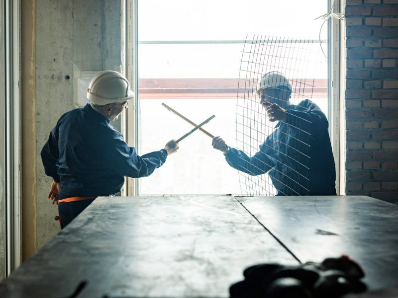 Construction workers fighting on the job