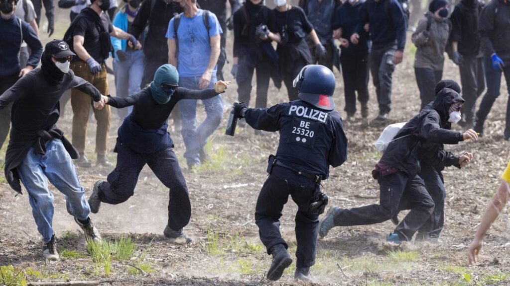 Protesters And Police Clash Outside Of German Tesla Factory